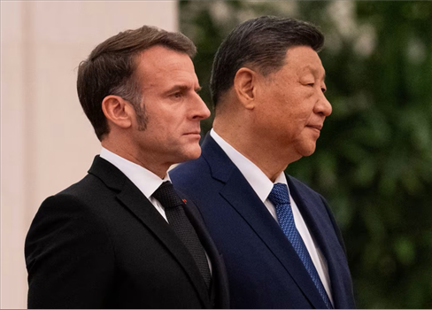 ماكرون يلوّح برسوم جمركية على الصين