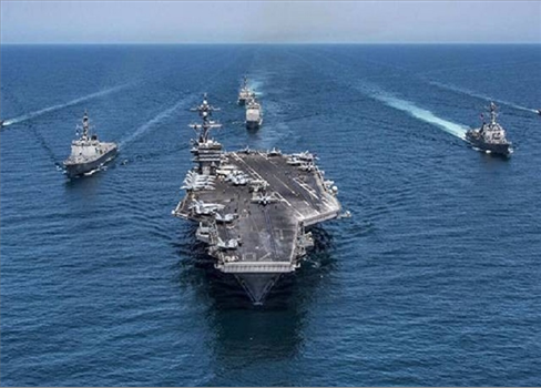 الولايات المتحدة تنشر 12 سفينة حربية بالشرق الأوسط